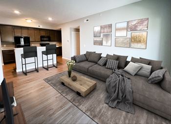 a living room with a couch and a table